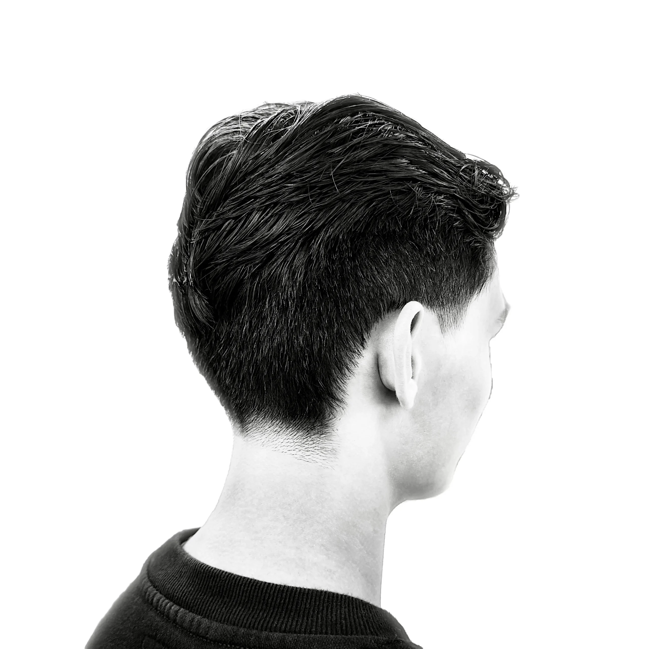 Men's haircut with a natural taper by Reza Barber in Irvine, CA — black and white